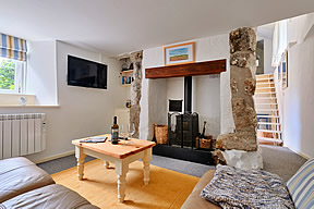 Farm Cottage - lounge with wood burner stove