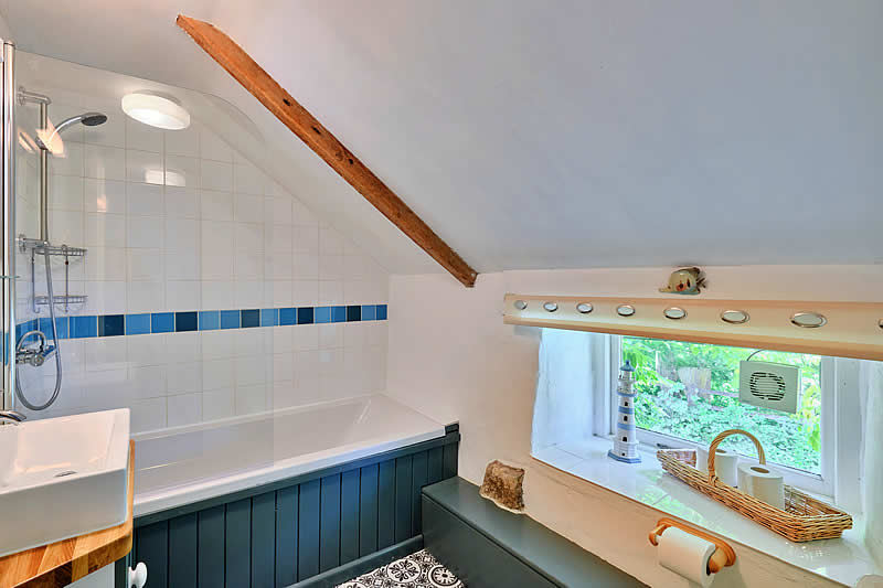 Bathroom with shower over bath